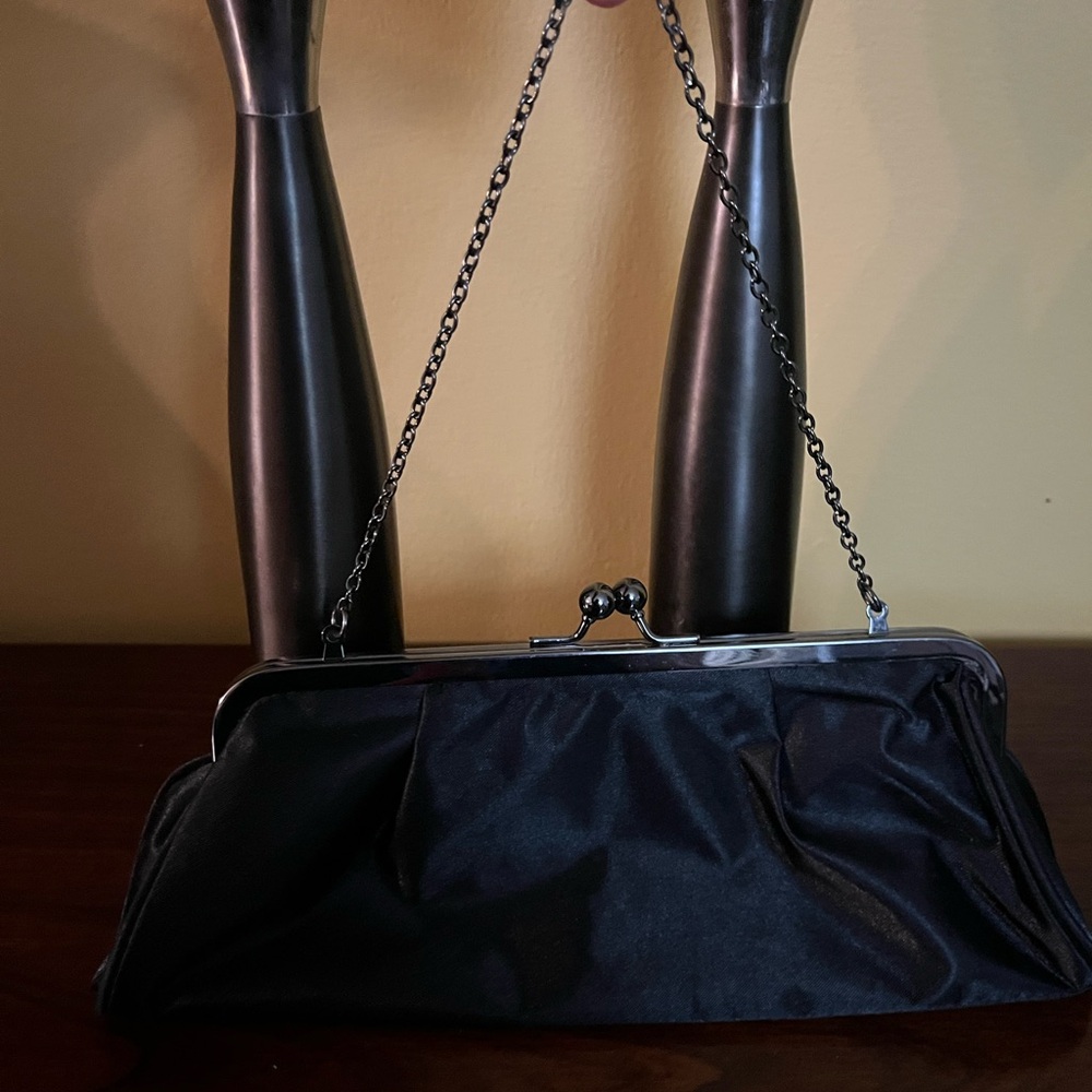 L’Oréal of Paris Black Satin Kiss Lock Clutch with Chain Strap Silver Hardware